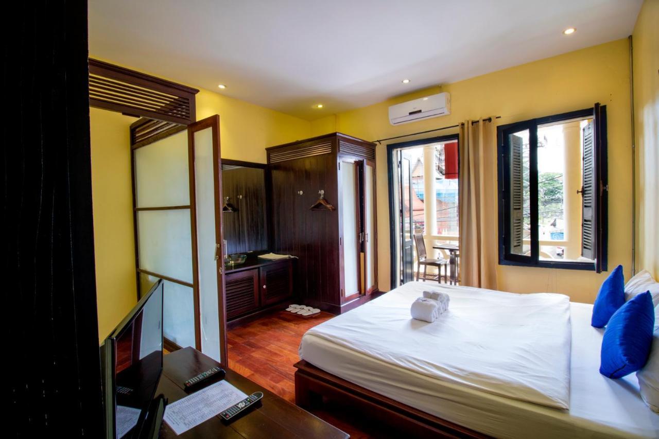 Inthira Thakhek Hotel Bagian luar foto